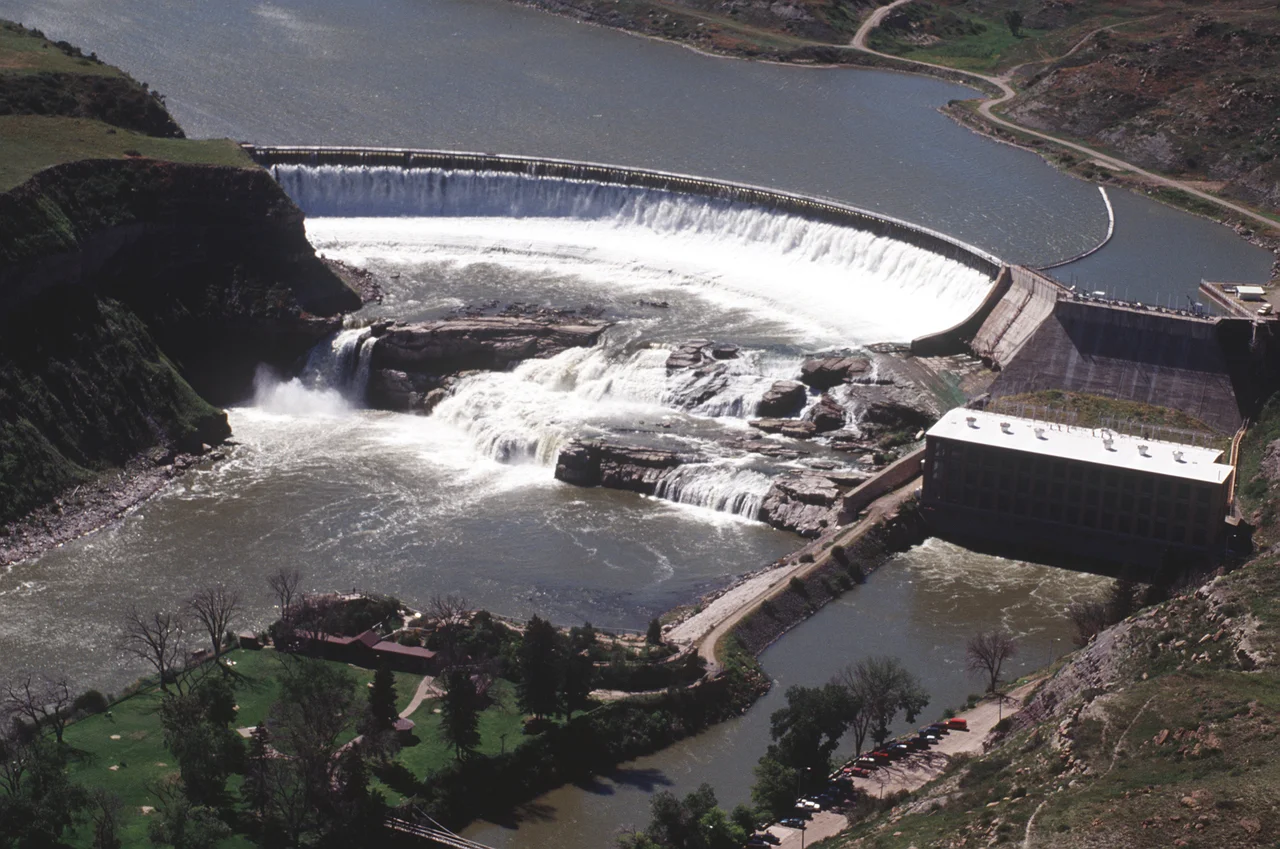Aerial view of Ryan Dam gives a clear reason why nearby Great Falls, Montana received its name. Great Falls is the location of Malmstrom Air Force Base, one of the locations for an Operational Readiness Inspection (ORI), which tests a unit's ability to operate in a simulated wartime environment and Air Force members will practice their jobs under wartime scenarios and conditions.Location: MALMSTROM AIR FORCE BASE, MONTANA (MT) UNITED STATES OF AMERICA (USA)