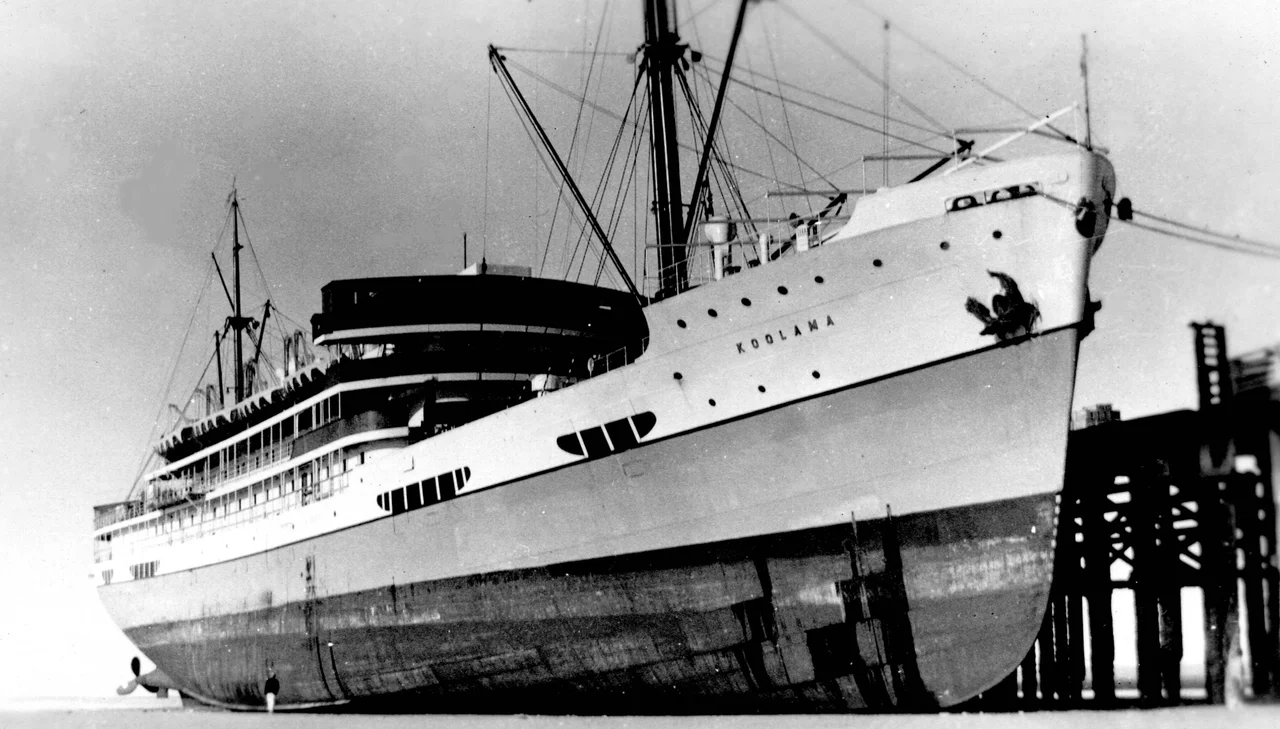 SS Koolama, which belonged to the State Shipping Service of Western Australia, docked at low tide at Broome, c. 1940.